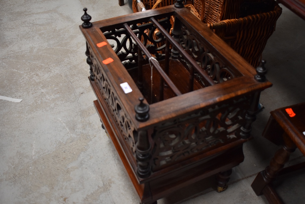 A Victorian rosewood canterbury, having fretwork decoration and drawer base, dimensions approx. 48 x