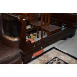 A modern hardwood sleigh bed, king size, approx 150cm internally (approx width including frame