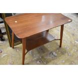 A vintage sapele coffee table, approx 76 x 46cm, with splay legs and undertier