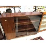 A vintage mahogany bookshelf with side cupboard, width approx. 106cm