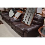 Two modern brown leatherette three and two seater settees