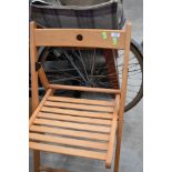 A folding wooden chair