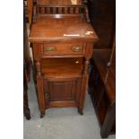 A Victorian mahogany pot cupboard, in the Aesthetic style, labelled Starkey and Meild ,