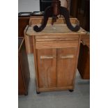 A vintage butchers block style kitchen trolley