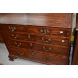 A Georgian style mahogany bureau having later handles , with fitted part inlaid interior