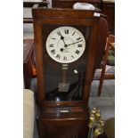 An early 20th Century oak cased time recorder clock, factory or office, dial bearing name '