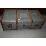 A vintage travel trunk , woodbound