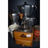 Three hob top coffee peculators, a grinder and a vintage coffee tin and Horlicks mug.