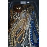 A selection of costume jewellery including white metal chain, beads, bangles etc