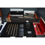 An assortment of fountain pens,biros,pencils and cartridges, a lot with boxes, includes Parker and