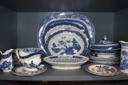 A Selection of vintage blue and white plates, platters, jugs and bowls and more among which are