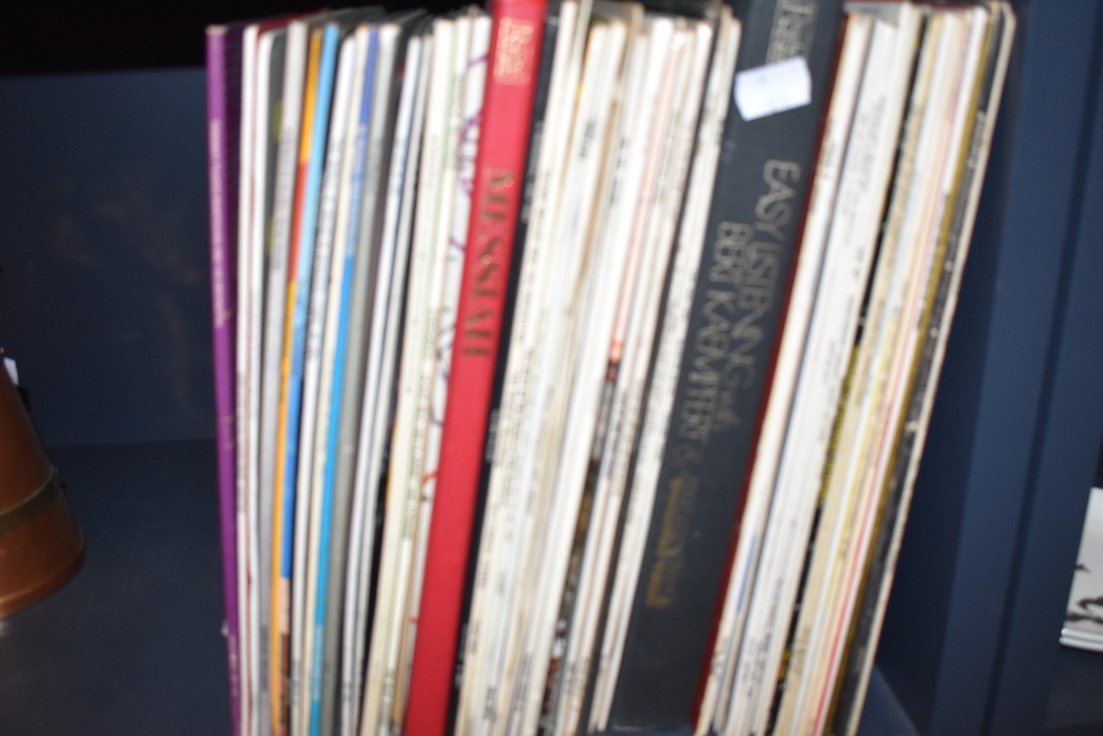 A selection of LP records including classical and swing.