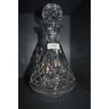 A Waterford crystal decanter.