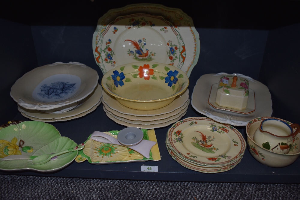 An assortment of ceramics including Carlton ware, Tudor ware and more, plates , bowls and butter