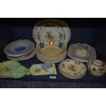 An assortment of ceramics including Carlton ware, Tudor ware and more, plates , bowls and butter