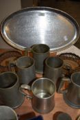 A selection of pewter tankards and similar hand worked plate by Keswick School of Industrial Arts