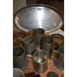 A selection of pewter tankards and similar hand worked plate by Keswick School of Industrial Arts