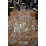 A selection of clear cut and crystal glass wares including hand blown decanter cut and etched