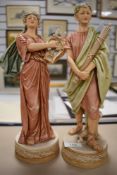 Two figures by royal dux both in a classical style girl with harp and man with axe (AF)