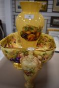 A small mantle urn by Royal Worcester having twin handle decoration and similar Aynsley jug and