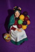 A figure base by Royal Doulton on green back stamp The Balloon Lady