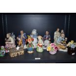 An assorted lot of figurines and ornaments among which are Crown Staffordshire and similar floral