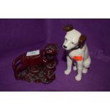 A ceramic figure of a dog in the HMV style and Chinese tiger