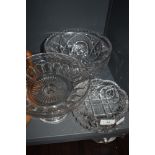 A selection of clear cut crystal glass wares including heavy cut bowls and footed tazza