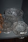 A selection of clear cut crystal glass wares including heavy cut bowls and footed tazza