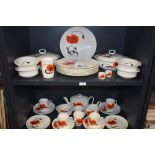 A large quantity of Wedgewood in a Susie cooper design 'corn poppy' dinner service, including