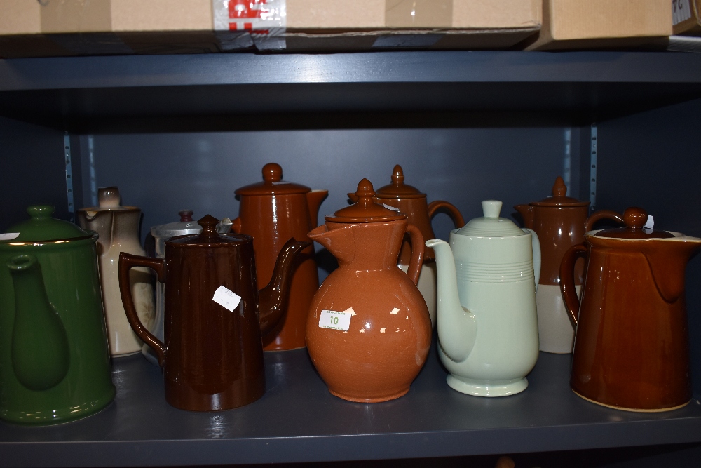 A mixture of coffee pots including Woods ware, Sadler and Denby.