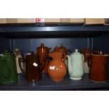A mixture of coffee pots including Woods ware, Sadler and Denby.