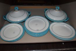 A part dinner service by Royal Worcester in a blue and gilt glaze