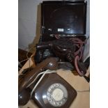 A vintage bakelite Ormond E1022 hairdryer in original bakelite box and a rotary dial BT telephone.