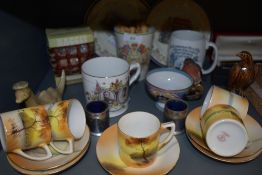 A mixed selection of ceramics including Noritake coffee cans with tree scenes,coronation wear and