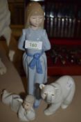 A selection of figures by Lladro and Nao including Polar bear and Angel