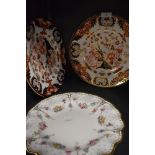 Three Royal Crown Derby plates, two having Imari pallet and the other having fluted edges,delicate