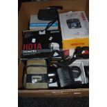 A selection of photographic equipment lens and cameras including KodaK Vivitar and Sanyo