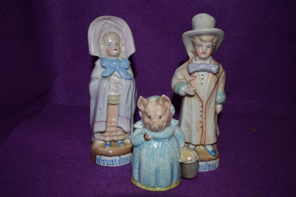 A Beswick Beatrix Potters 'Aunt Pettitoes' figurine and Two vintage grandpa and grandma figures.