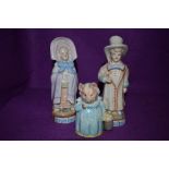 A Beswick Beatrix Potters 'Aunt Pettitoes' figurine and Two vintage grandpa and grandma figures.
