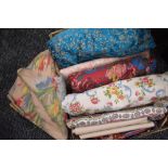 A mixed lot of fabric, mainly vintage including bark cloth, with a few modern pieces included,some