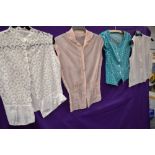 Four 1950s blouses in various colours,fabrics and styles, in smaller sizes.