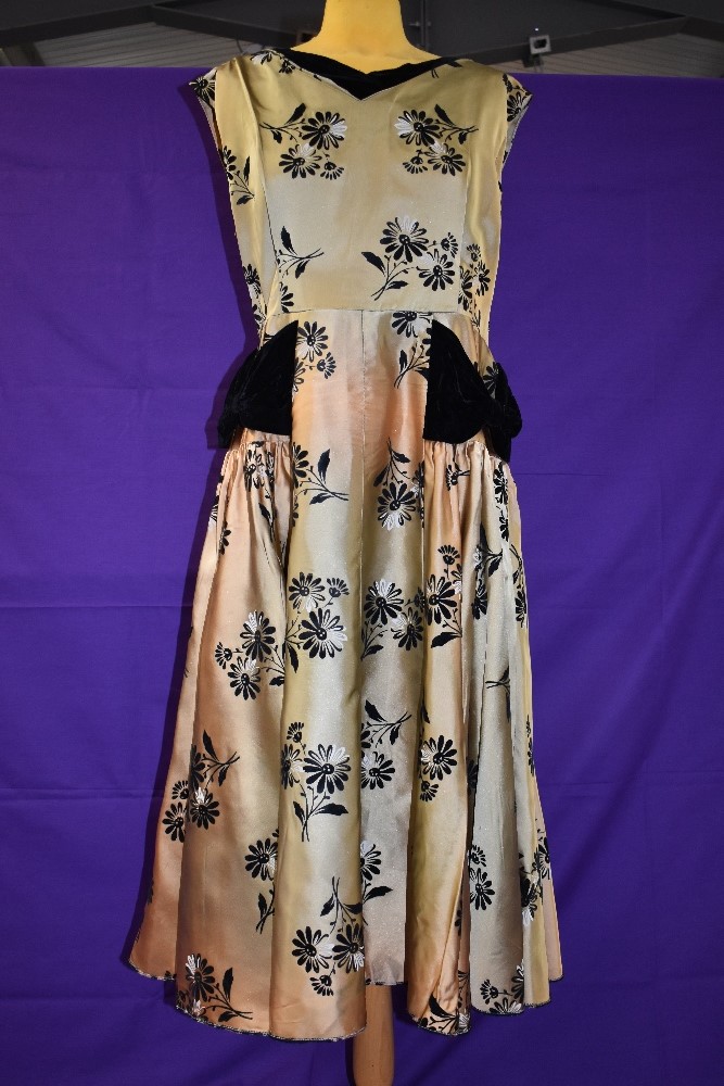 A vintage 1950s gold dress with flocked pattern and black velvet detailing to neckline and skirt, - Image 3 of 4