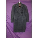 A vintage 1940s CC41 gents double breasted coat in blue checked wool having half belt to vented