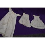 Two early 20th century childrens dresses with beautiful cut work and embroidered techniques used,