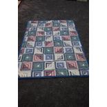 A retro patchwork quilt with fleece edges and sheepskin lining,made in germany,single in size.