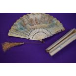 A hand coloured French fan, circa 1840, with lithographic classical scene to front and country