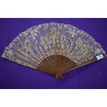 A lace fan having sequins and spangles with early plastic ribs, around early 20th century.