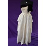 A London Town strapless cream watered taffeta gown with tiered skirt to back and black velvet