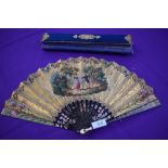 An early 19th century fan, thought to be for the Chinese export market having hand painted scenes to